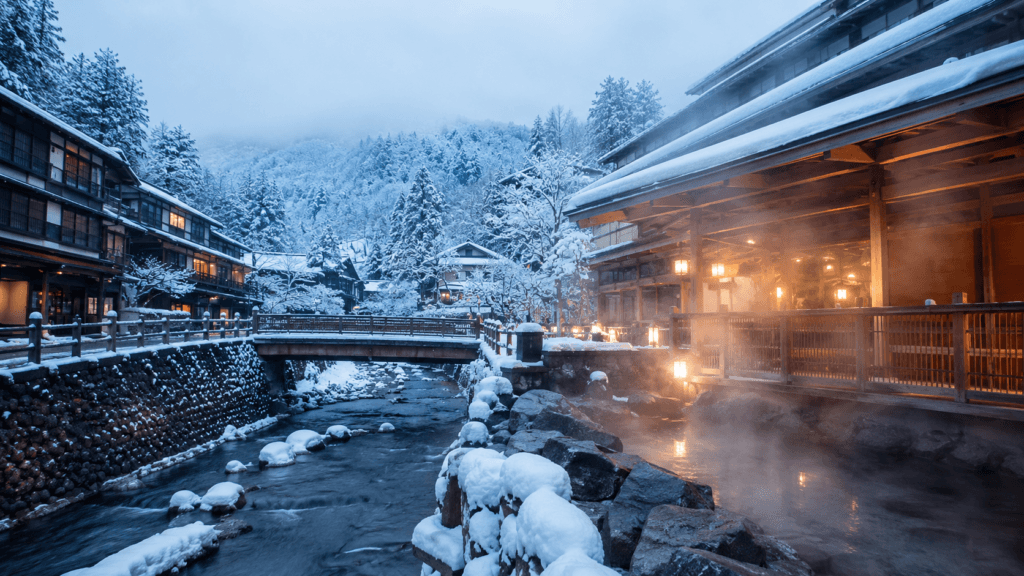 Snow-covered Japanese onsen town with traditional ryokan