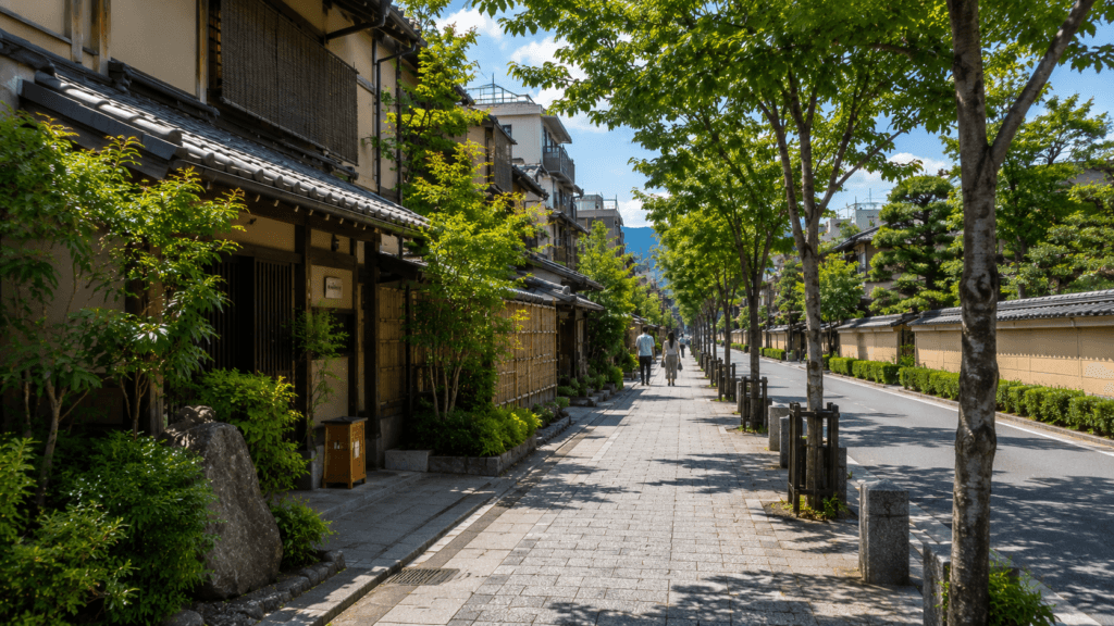 Quiet Kyoto neighborhood street with trees, traditional details and a calm local atmosphere near historic areas