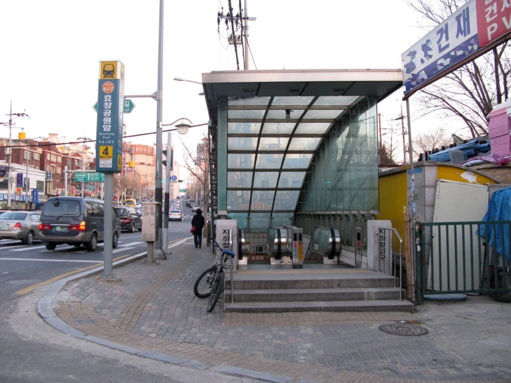 Hyochang Park subway station entrance on a Seoul neighborhood street