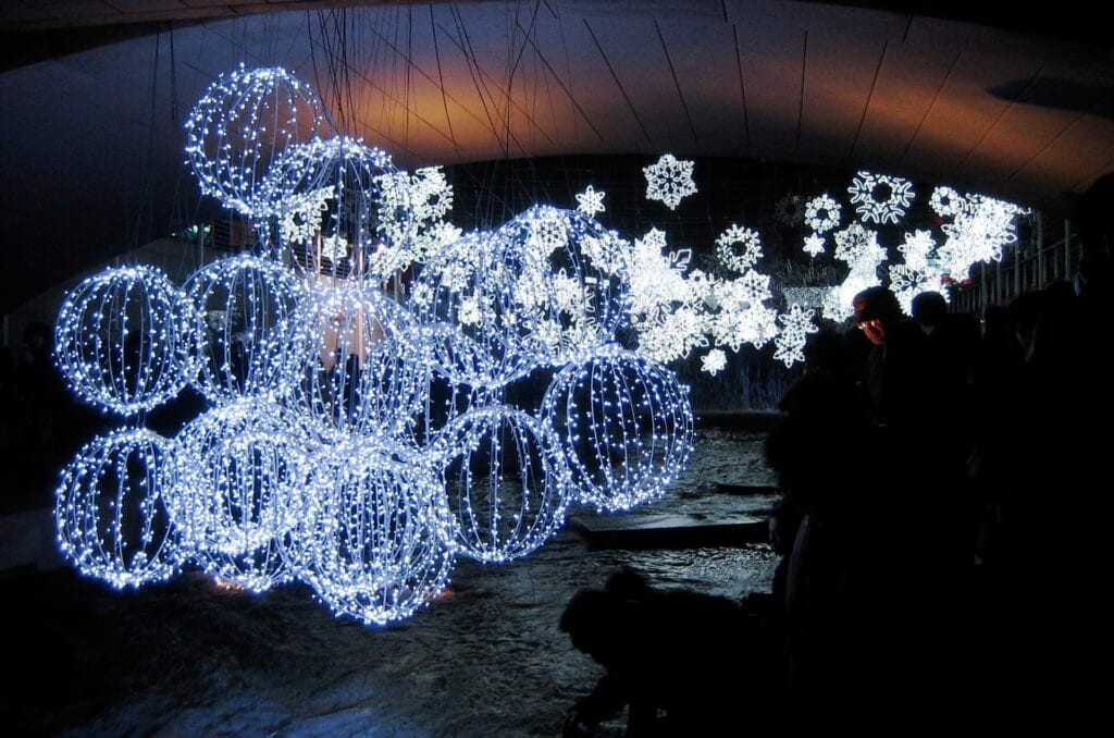People walking beside winter lights at Cheonggyecheon in Seoul in December 2008