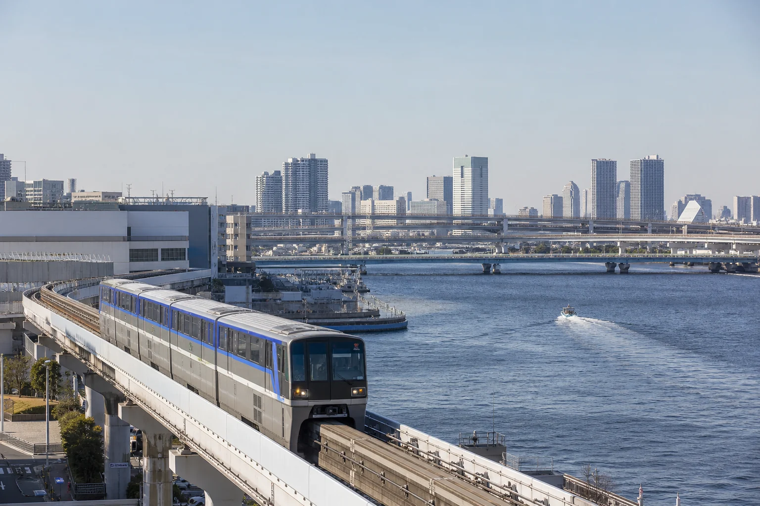 Tokyo Monorail traveling beside Tokyo Bay from Haneda Airport